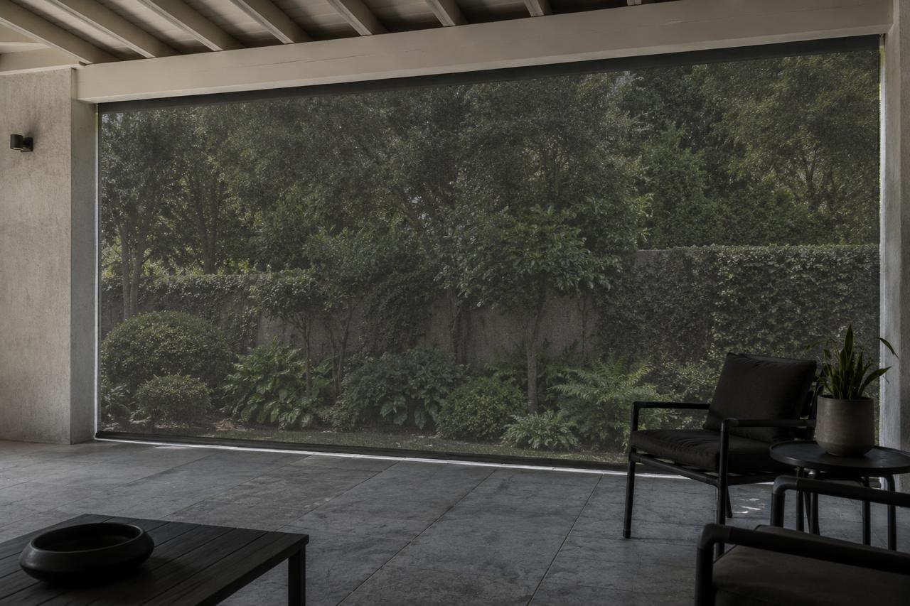 Solar screen blinds on a covered Fresnaye terrace